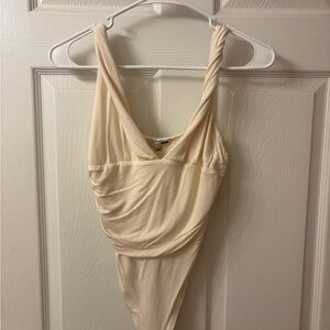 Fashion Nova Cream Twisted-Strap V-Neck Bodysuit